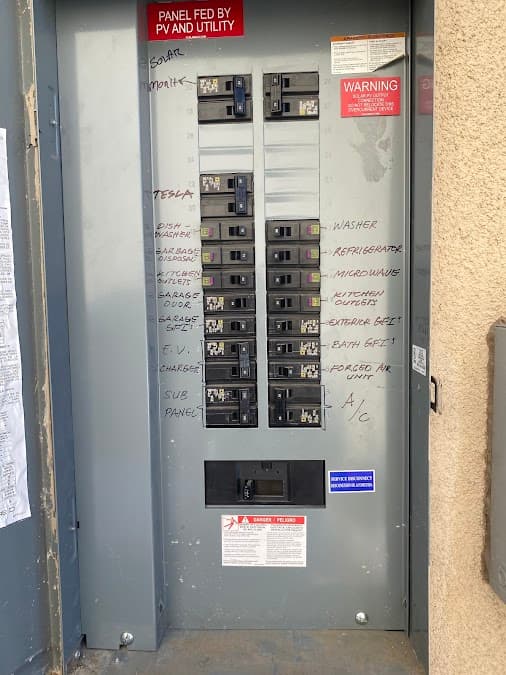 Residential service panel with dedicated Tesla and EV charger circuits
